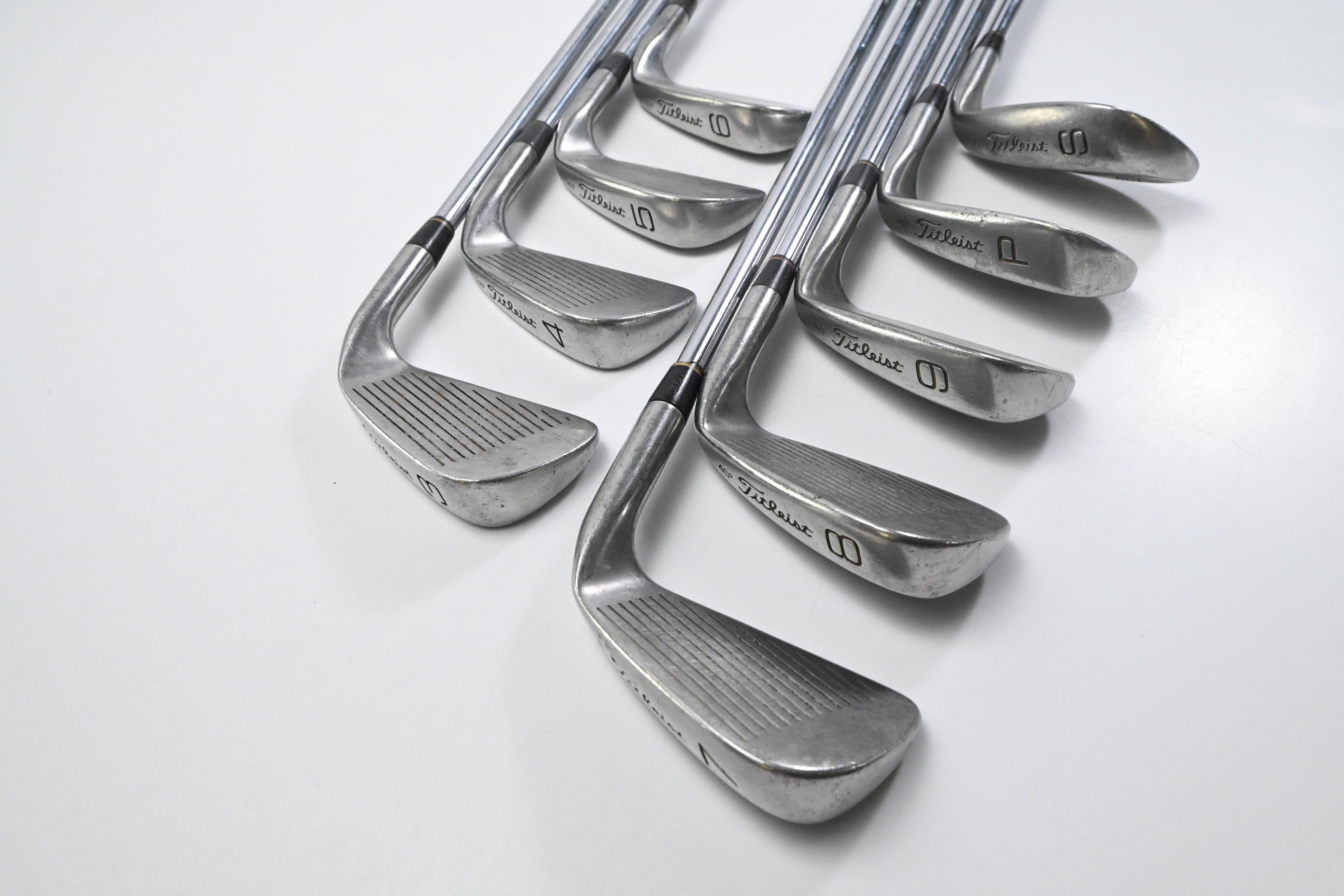 Left Hand Titleist DCI Gold Irons / 3-PW+SW / Regular Flex MS-209 Shafts