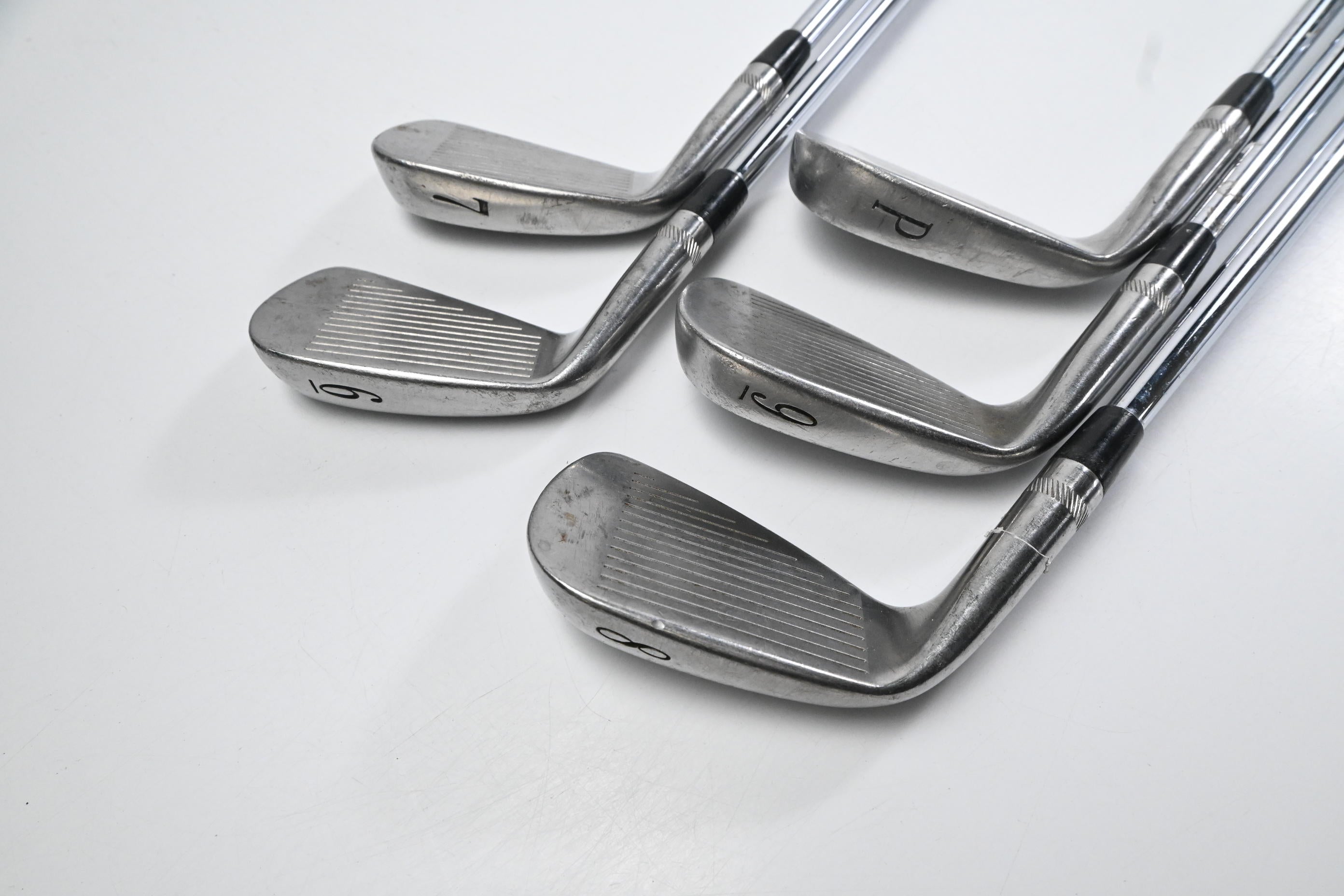 Titleist DCI 990 Irons / 6-PW / Regular Flex Gold Plus Sensicore Shafts