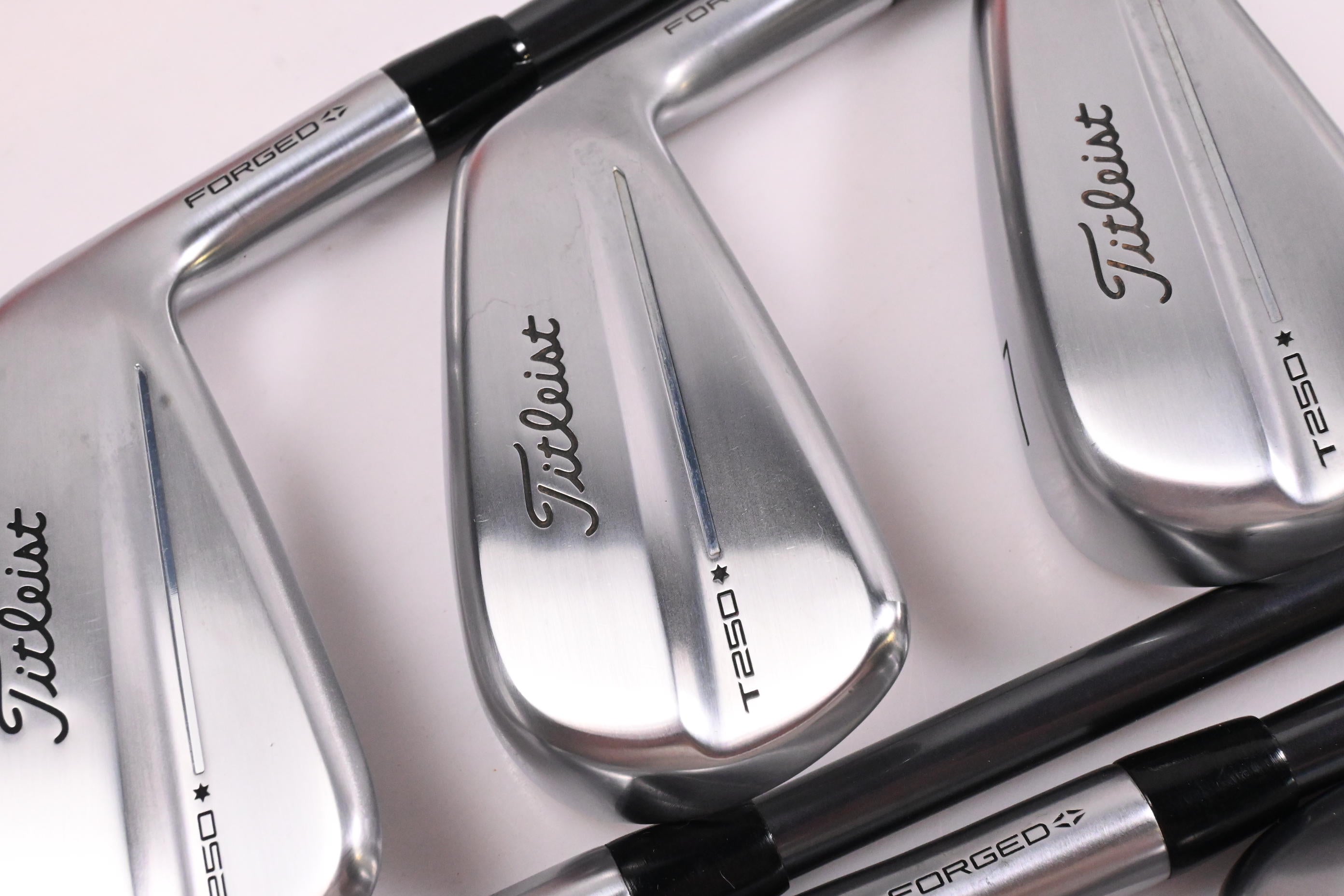 Titleist T250* 2025 Irons / 5-PW+52° / Senior Flex MMT AMC Red 65 Shafts