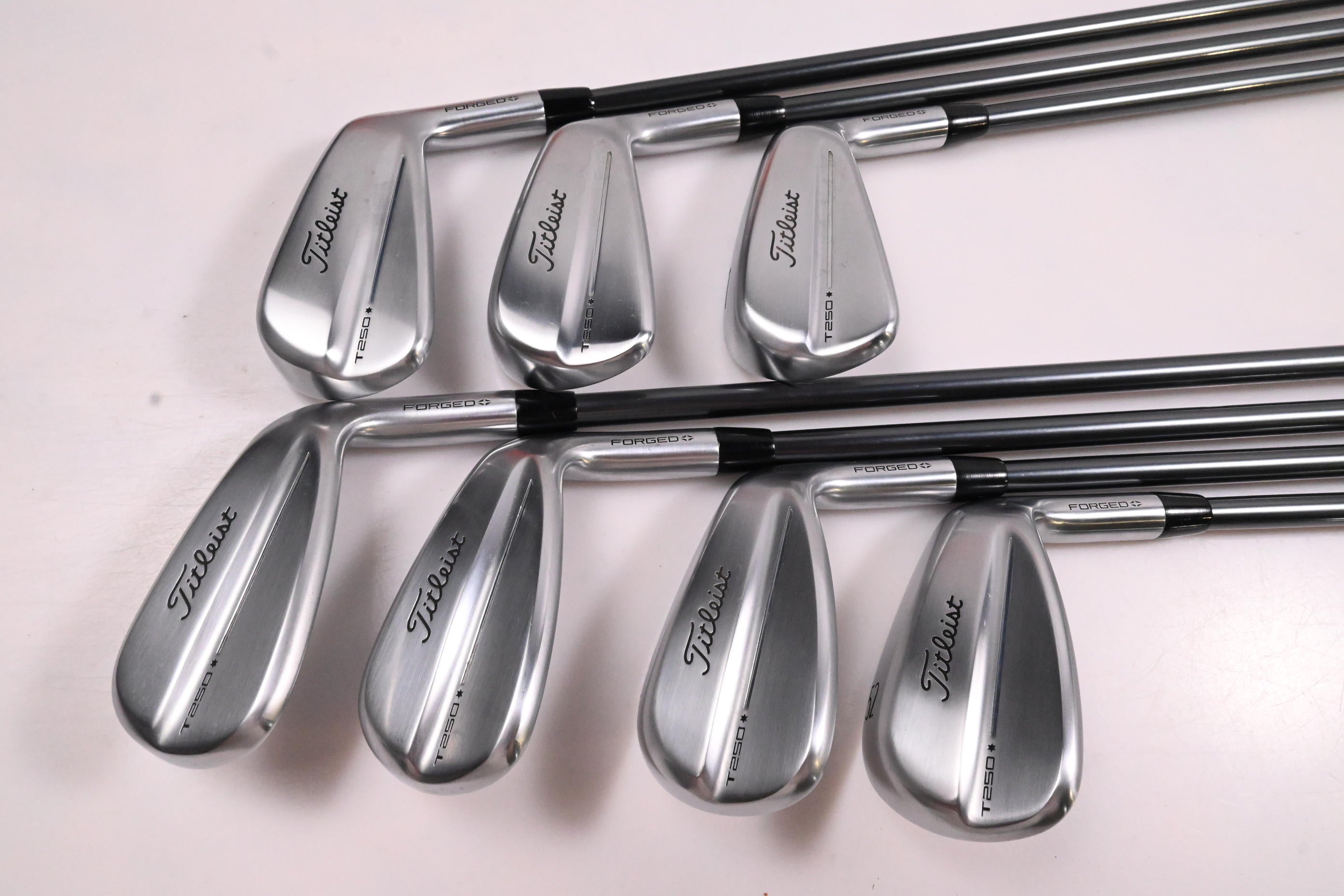 Titleist T250* 2025 Irons / 5-PW+52° / Senior Flex MMT AMC Red 65 Shafts
