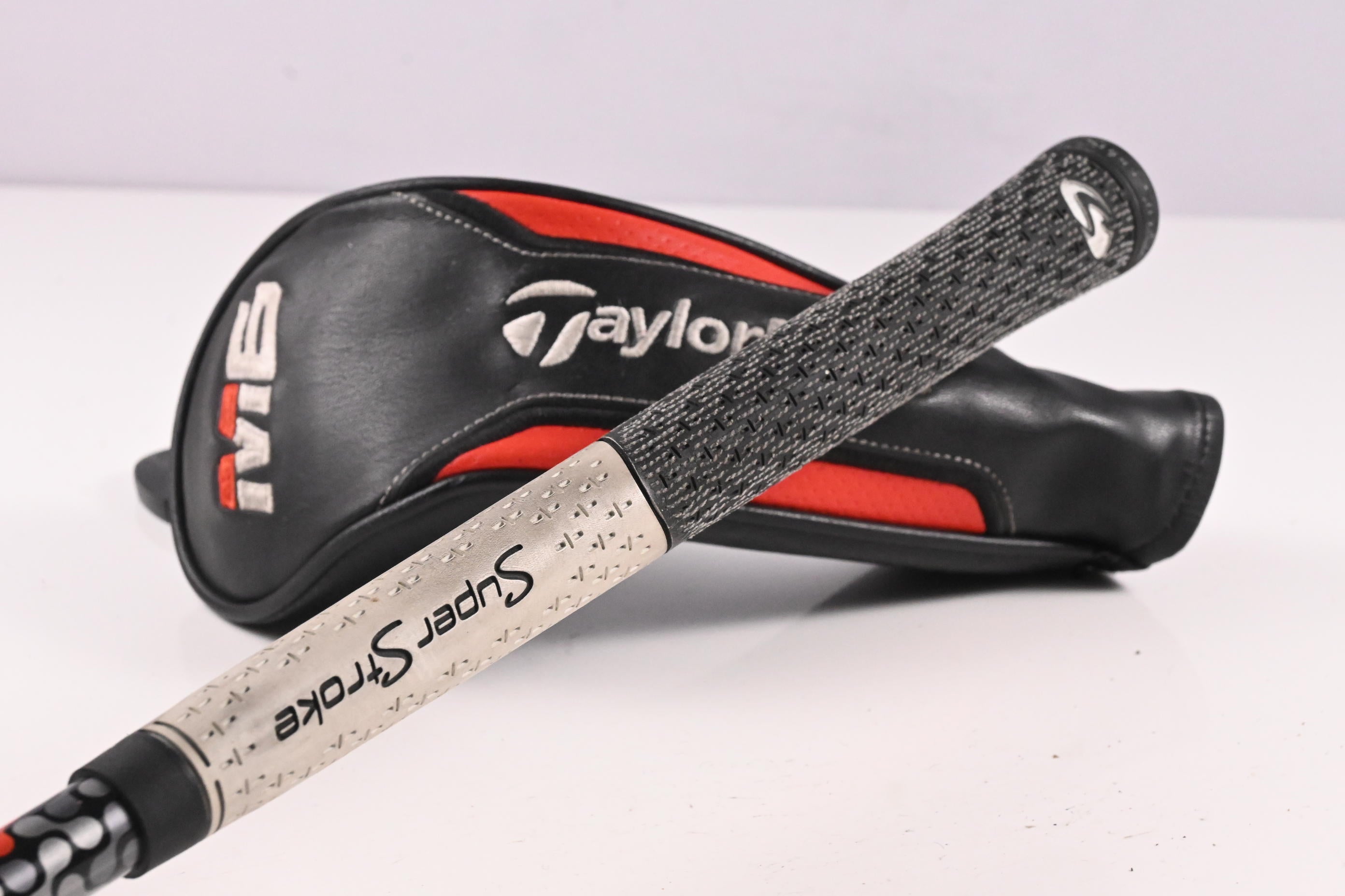 Taylormade M6 #7 Hybrid / 31 Degree / Stiff Flex Fujikura Atmos Orange 7 Shaft