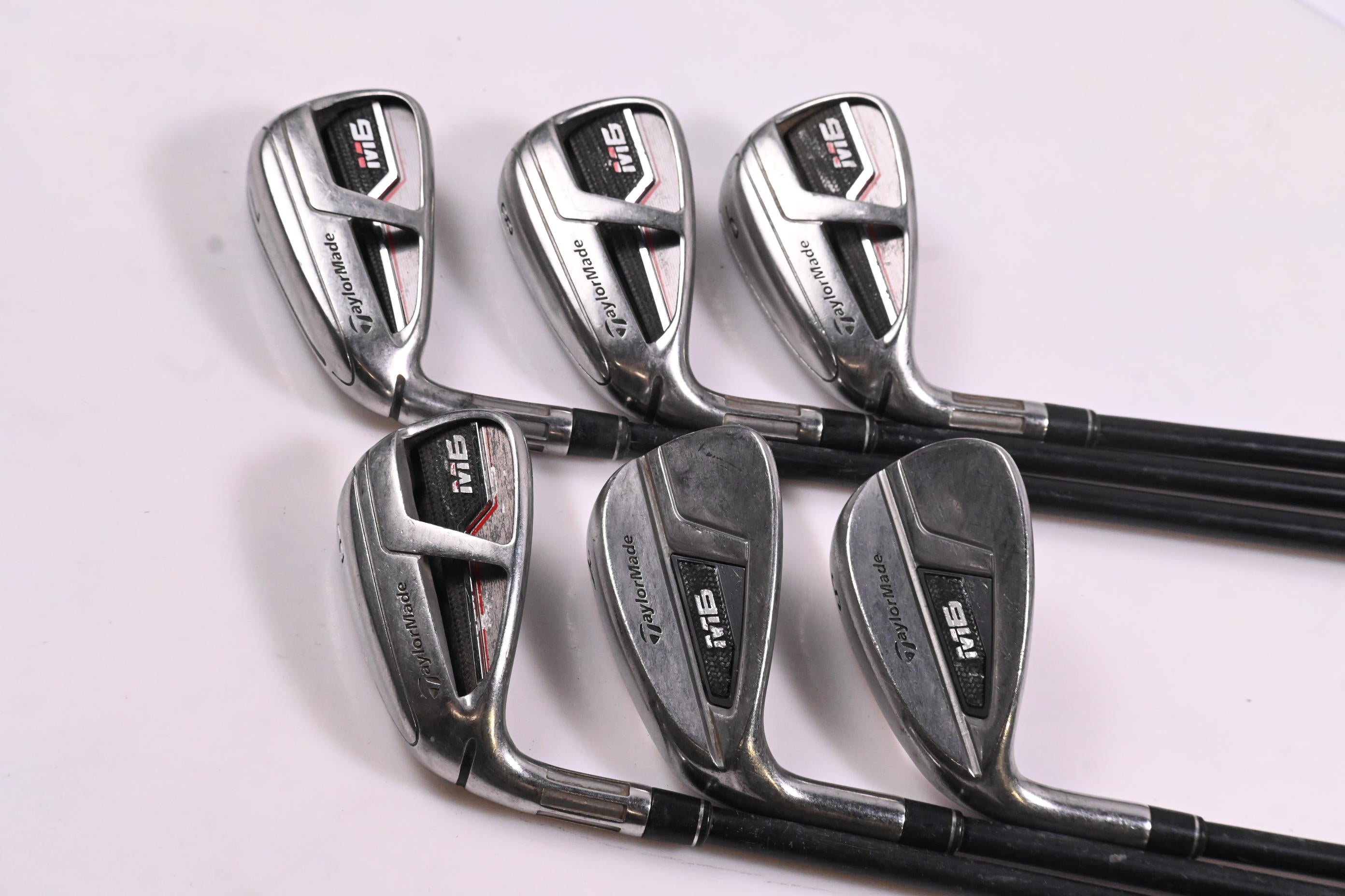 Left Hand Taylormade M6 Irons / 7-PW+GW+SW / Regular Flex Atmos Orange 6