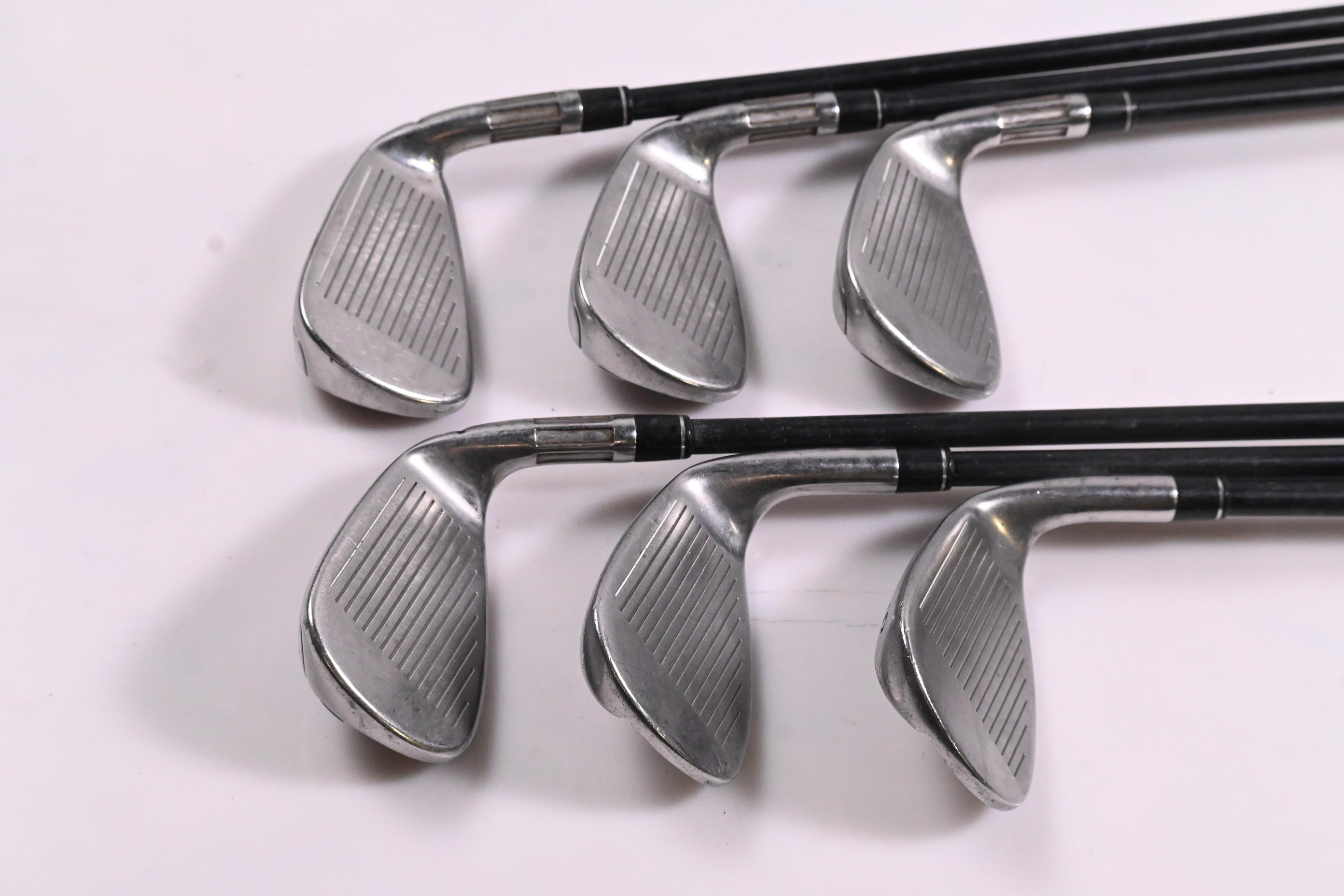 Left Hand Taylormade M6 Irons / 7-PW+GW+SW / Regular Flex Atmos Orange 6
