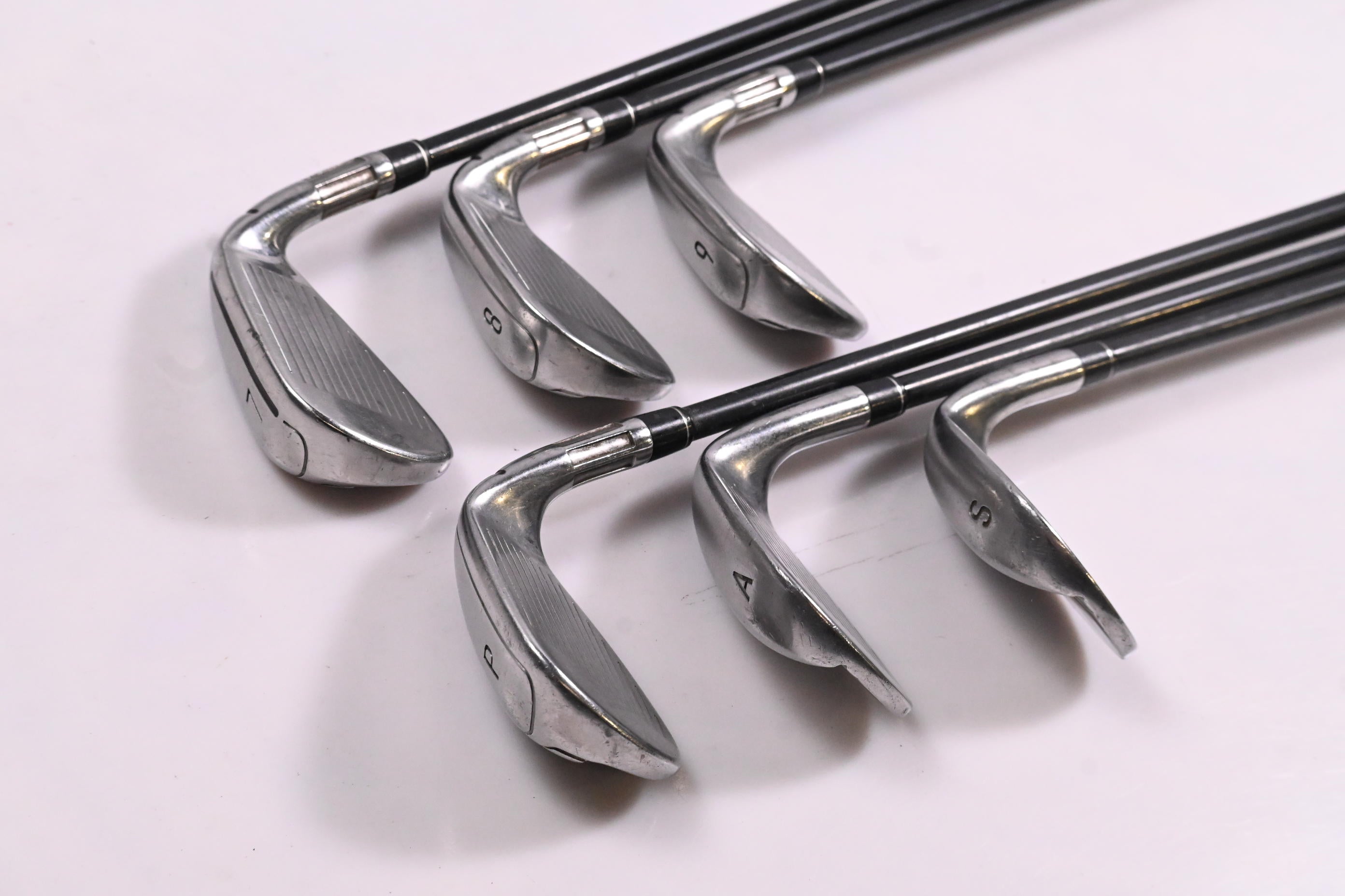 Left Hand Taylormade M6 Irons / 7-PW+GW+SW / Regular Flex Atmos Orange 6