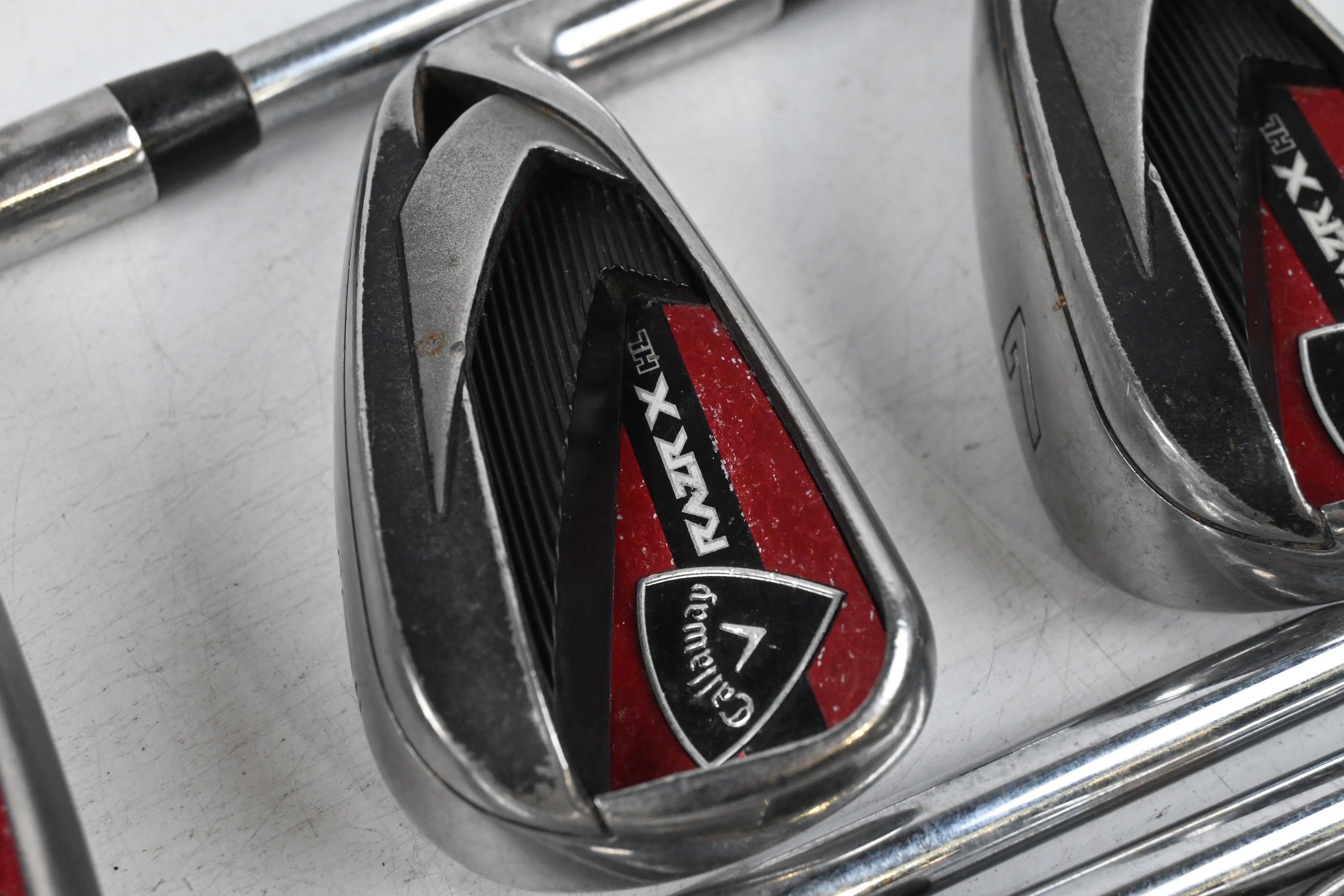 Callaway RAZR X HL Irons / 5-PW+SW / Uniflex M-10 XP Shafts