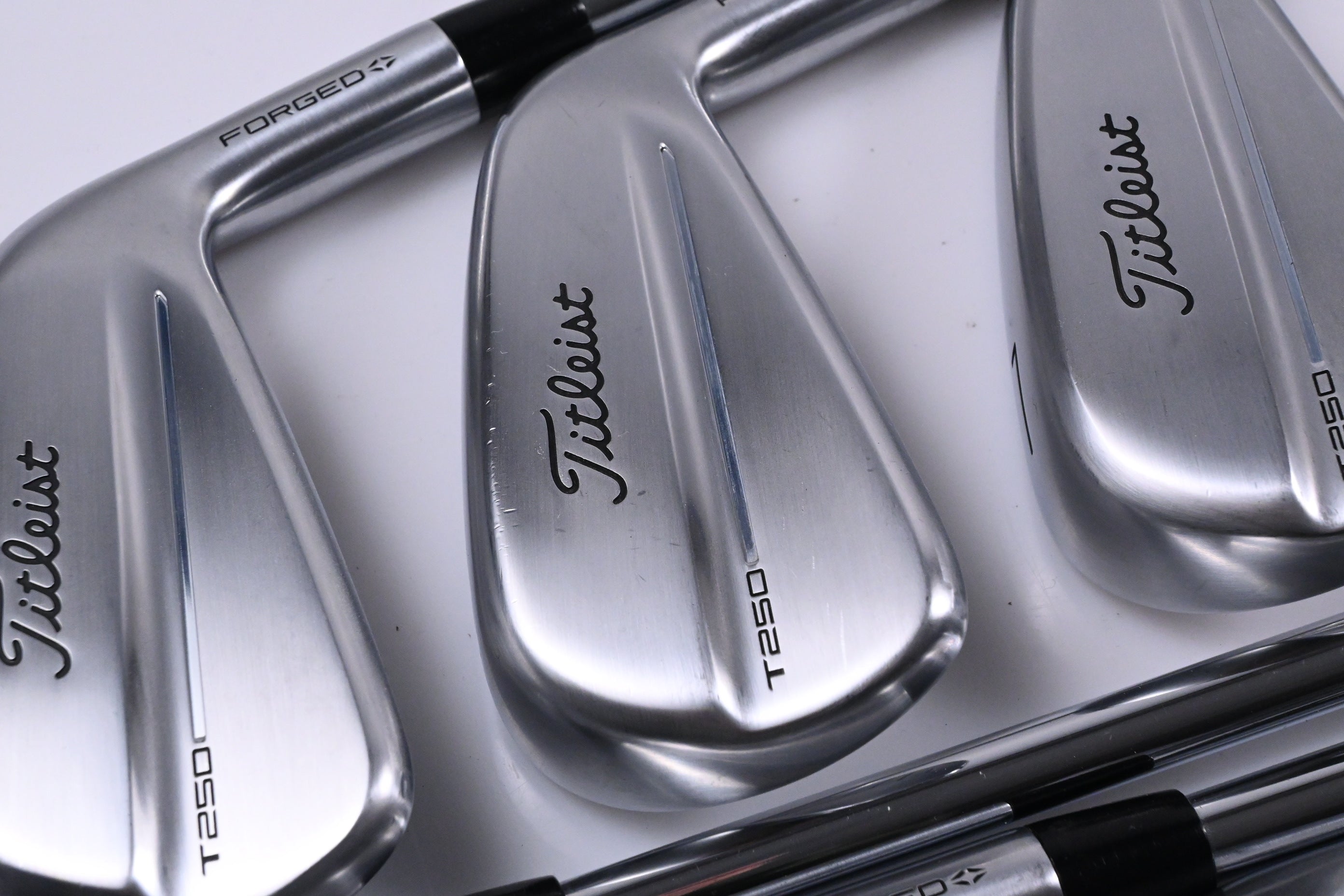 Titleist T250 2025 Irons / 5-PW+48° / Stiff Flex AMT Black S300 Shafts