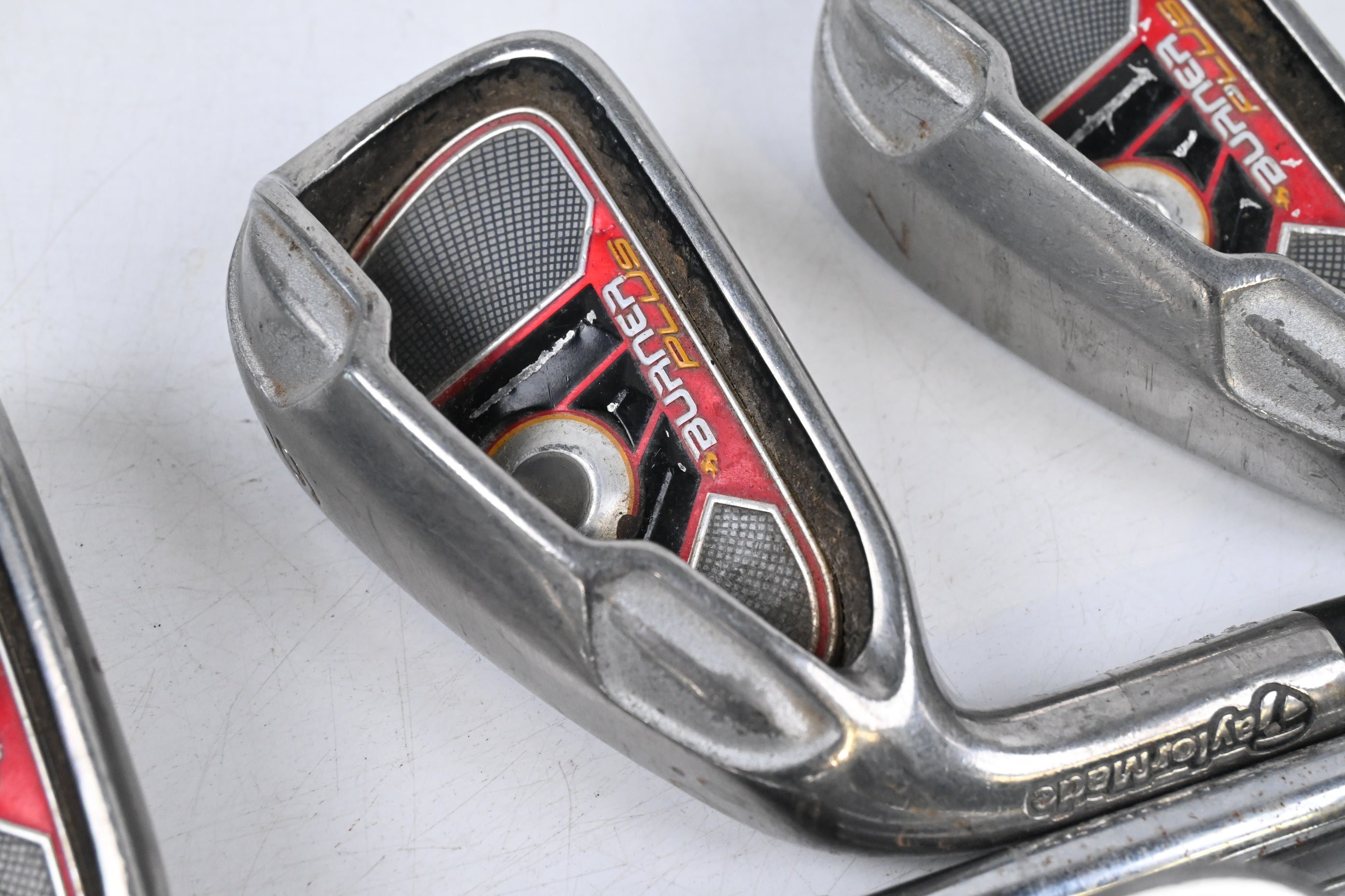 Left Hand Taylormade Burner Plus Irons / 4-PW+SW / Regular Flex Taylormade Shafts