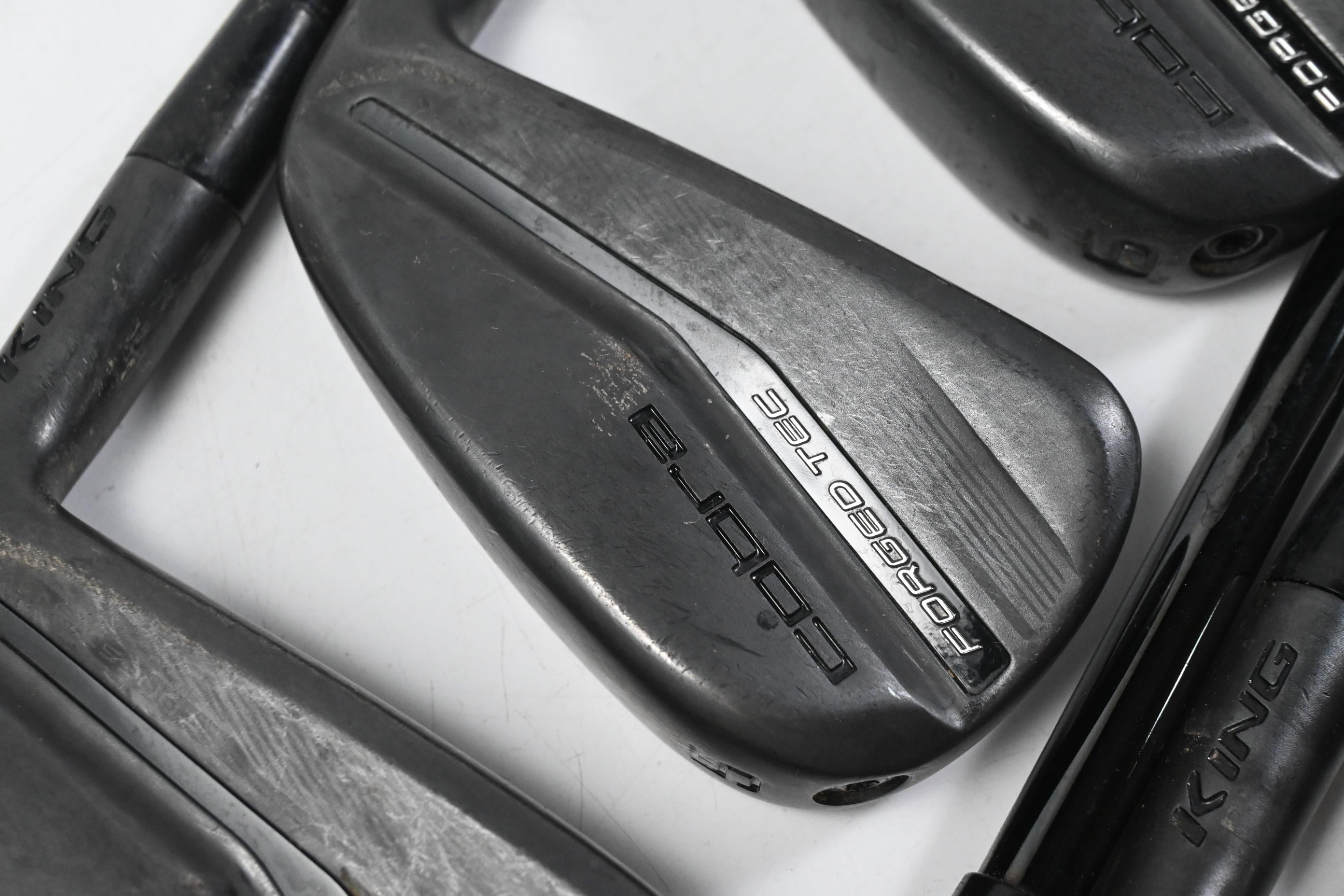Cobra King Forged Tec 2023 Black Irons / 4-PW / Stiff Flex KBS $-Taper Lite 100