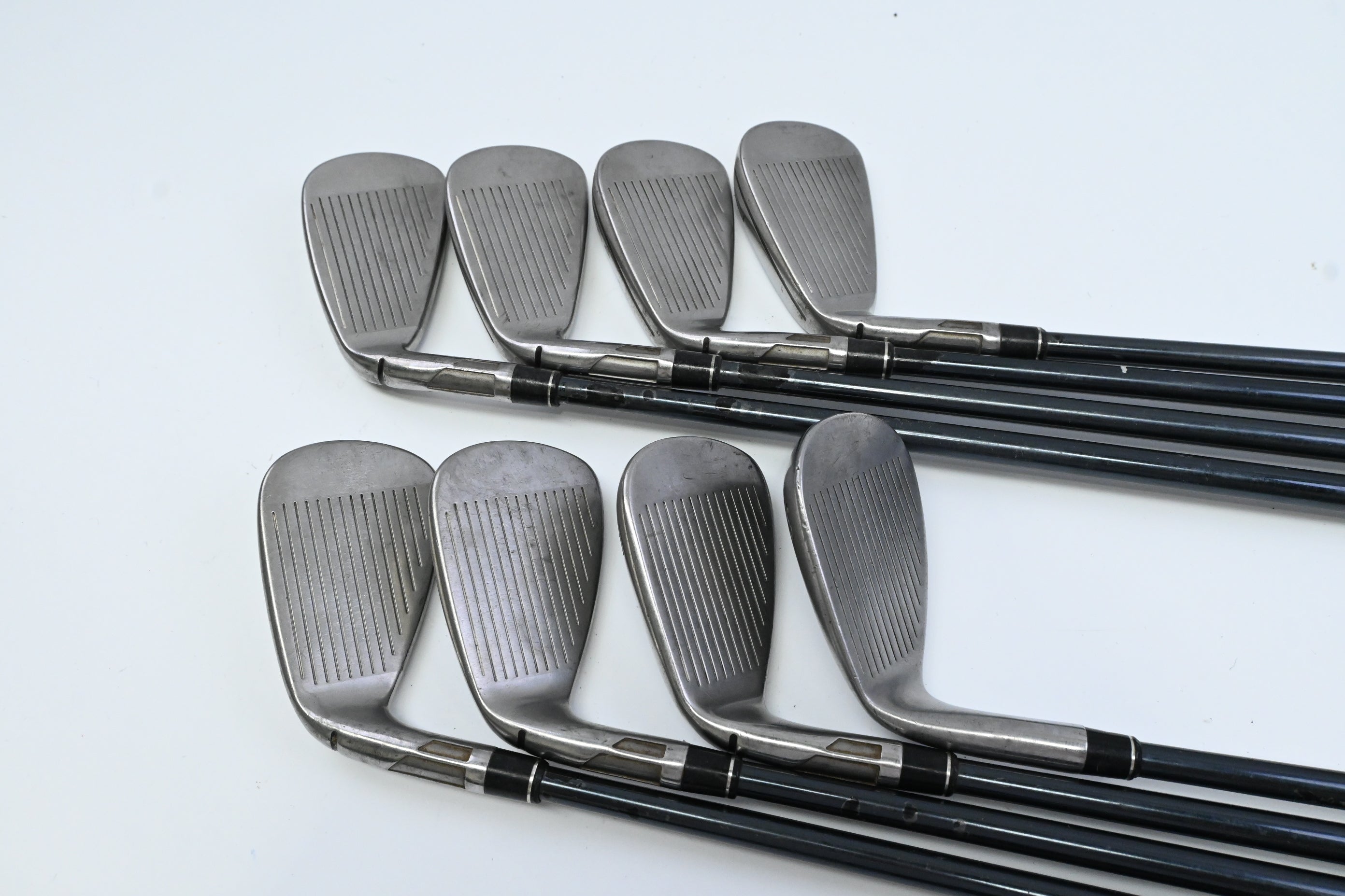 Taylormade Stealth Irons / 4-PW+SW / Stiff Flex UST Recoil Dart 90 Shafts