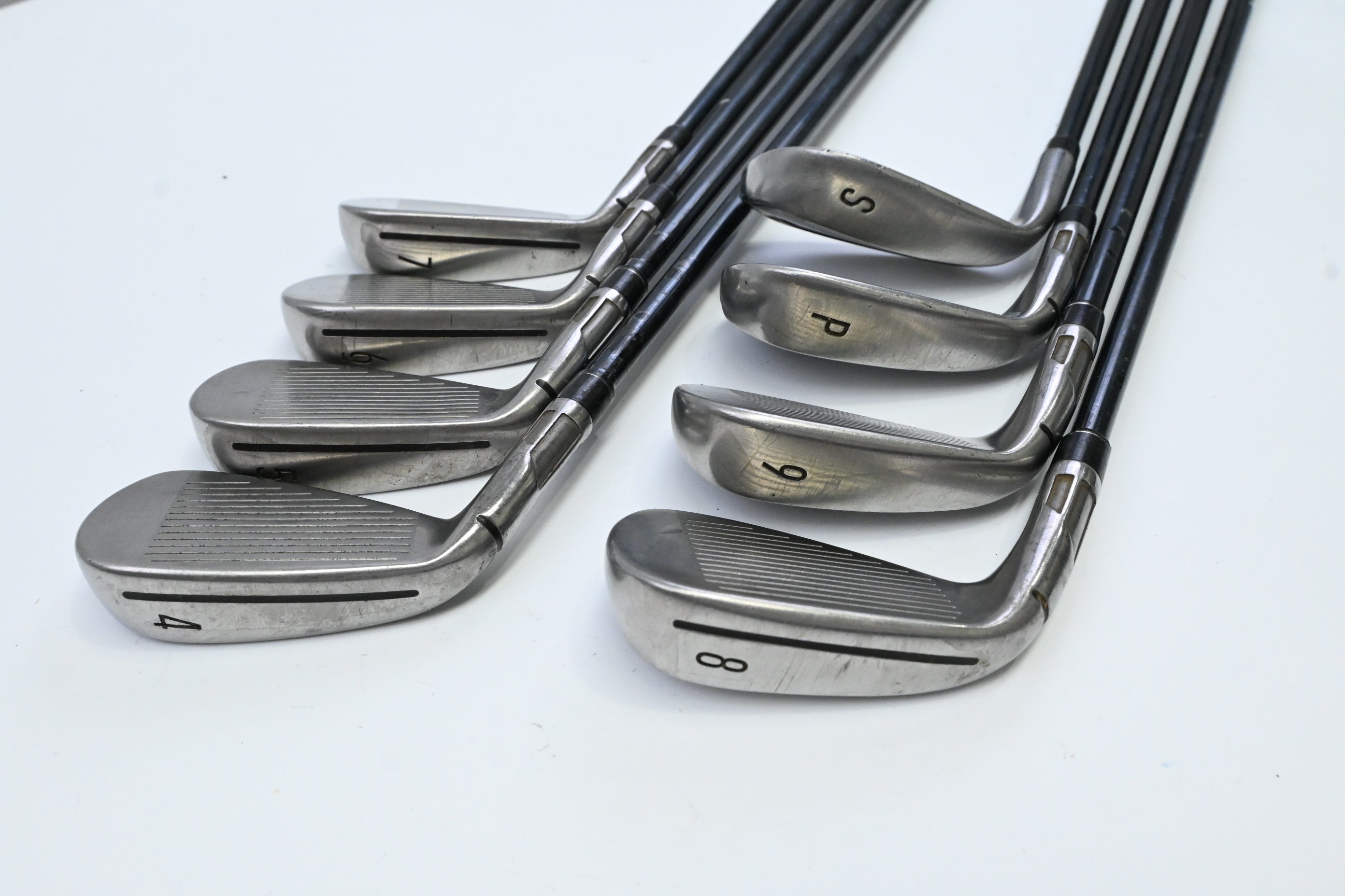 Taylormade Stealth Irons / 4-PW+SW / Stiff Flex UST Recoil Dart 90 Shafts
