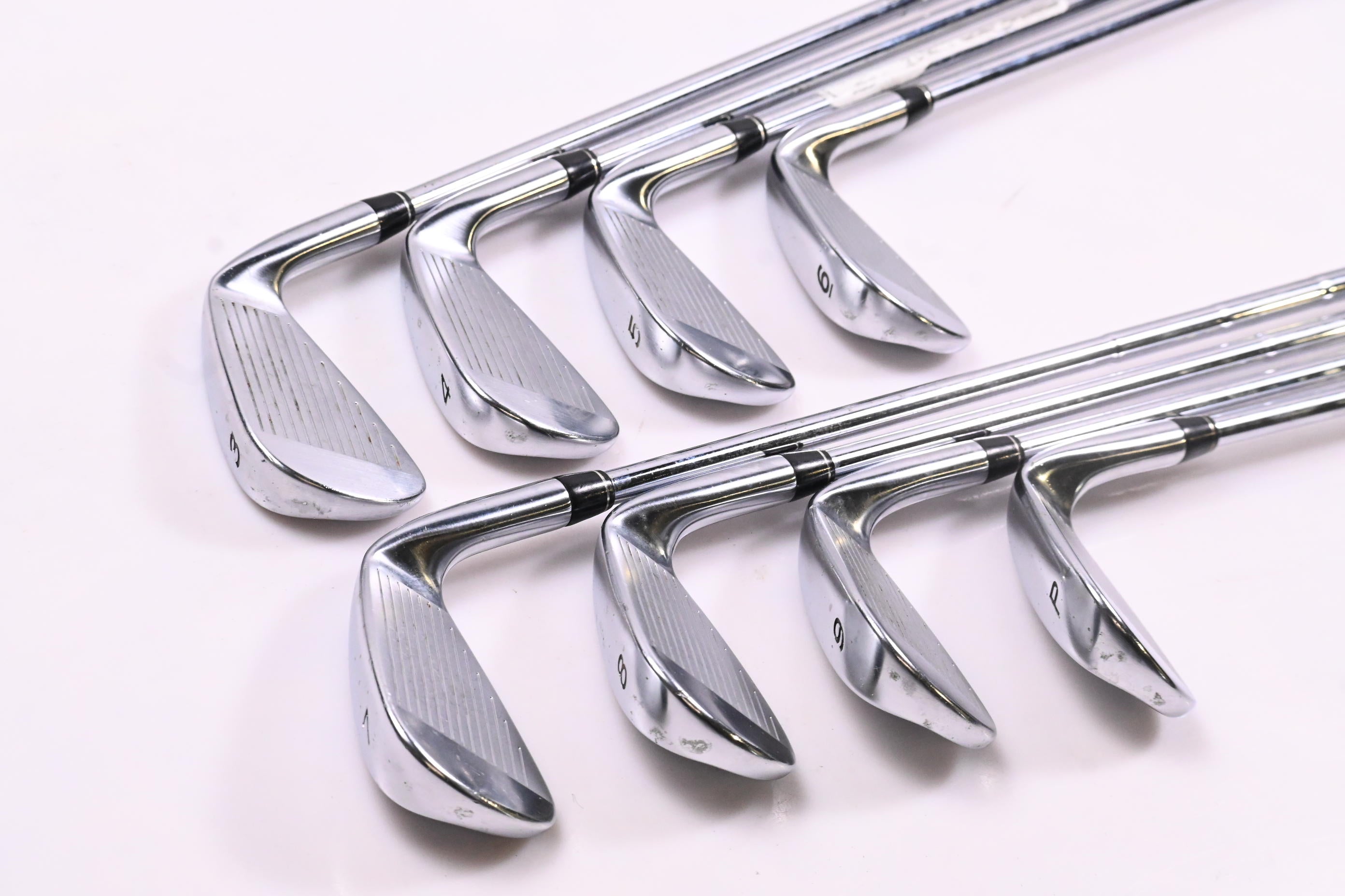 Left Hand Taylormade RAC LT Irons / 4-PW / Regular Flex Dynamic Gold R300 Shafts
