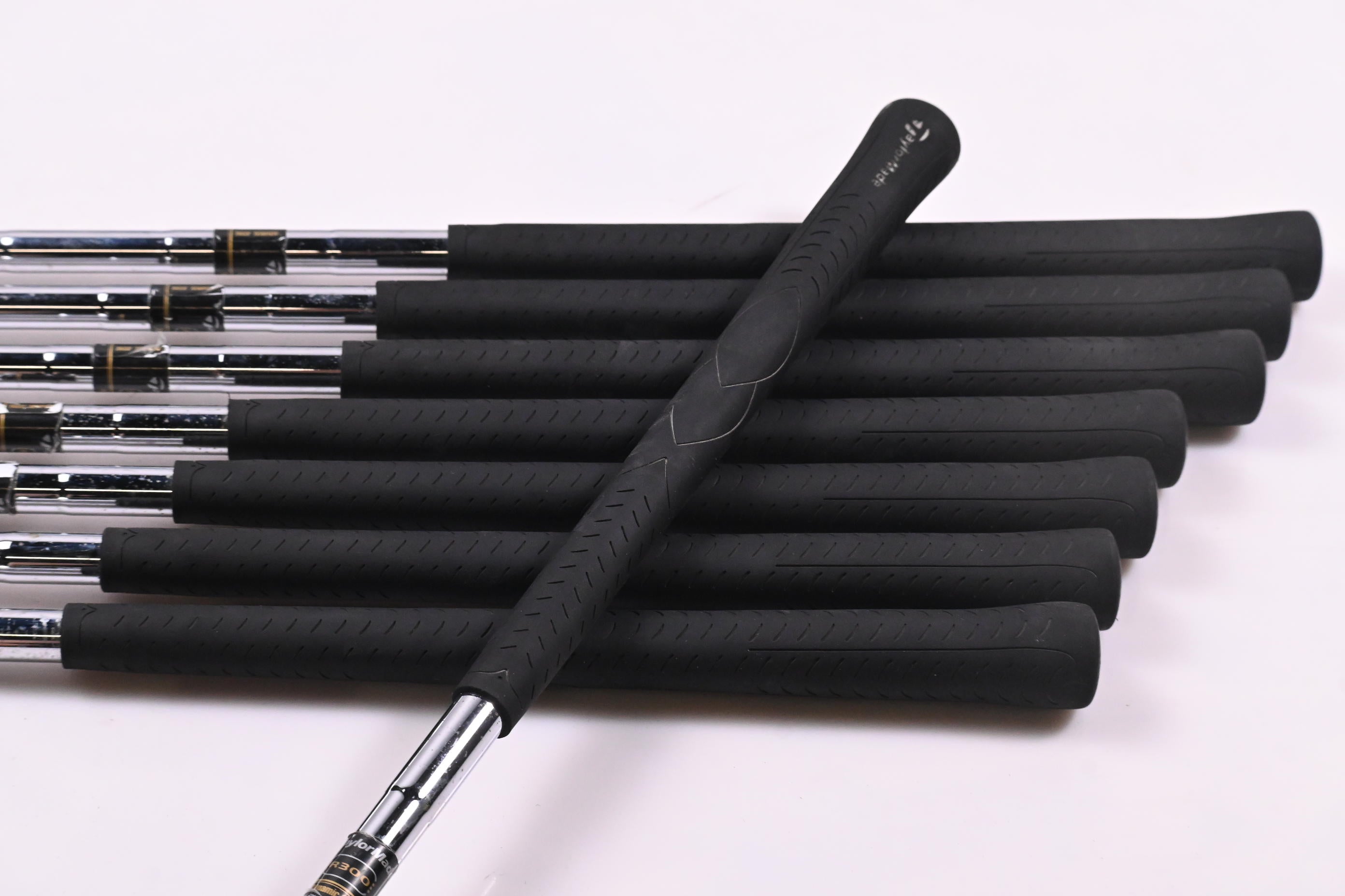 Left Hand Taylormade RAC LT Irons / 4-PW / Regular Flex Dynamic Gold R300 Shafts